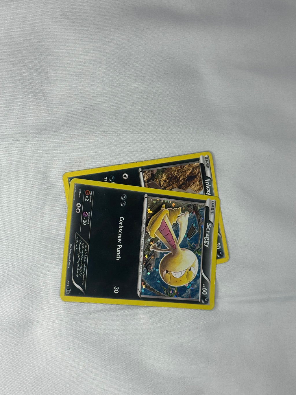 Inkay & Scraggy – 2 Pokémonkort från Steam Siege